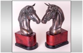 Bronzed Horse Head Bookends on faux mahogany and ebony plinths; 11.5 inches high overall x 5.5