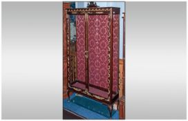A Stained Mahogany Double Glazed Door French Style Vitrine of square form. On small cabriole legs.