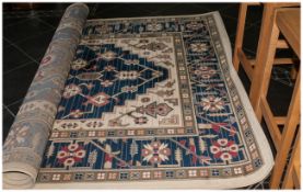 Large Cream Based Wool Rug Blue Geometrical Pattern . 116 by 80 inches.