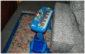 Childs Musical Piano and Stool.