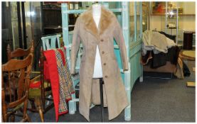 Ladies Suede Three Quarter Length Coat, Fur lined. Button fastening. Collar with revers. Approximate