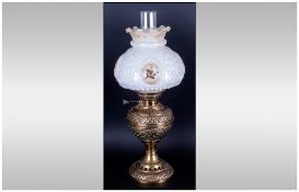 A Good Quality Edwardian Table Brass & Glass Oil Lamp, Maker Veritas with original shade. Circa