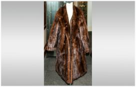 Ladies Three Quarter Length Light Brown Mink Coat, fully lined with half belt back. Collar with