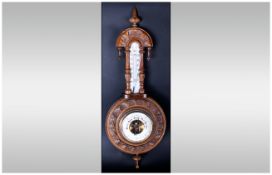 Lufft Walnut Vintage Ornate Carved Wall Barometer with brass movement. 23 inches high.