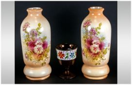 Pair of Crown Devon Vases, with floral decoration, full marks to base. Approx 12 inches in height.