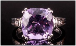 Amethyst Cushion Cut Ring, a 6.25ct solitaire cushion cut amethyst of strong purple colour, the