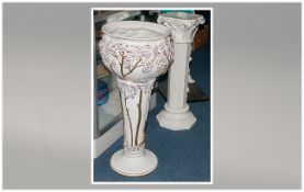 Modern White Porcelain Jardiniere And Stand. Floral guilt decoration plus one other.