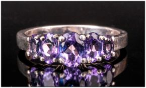 Silver Dress Ring Set With A Row Of 5 Graduating Amethysts, Stamped 925, Ring Size T½