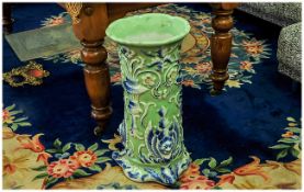 Large Japanese Celadon Glaze Stick Stand, of circular column shape, terminating in a tripod base;