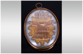 Unusual Antique Religious Medallion with a IHS Insignia, enclosed in a glazed frame. Also