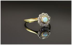 Antique 18ct Gold Set Opal and Diamond Cluster Ring. The Central Opal Surrounded by 12 Small