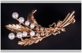 9ct Gold Brooch Of Floral Design Tied With A Bow, The 2 Stems Each Set With 4 Pearls And 3 Round Cut