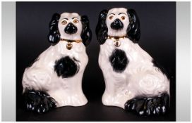 Pair Of Black & White Staffordshire Dog Figures.