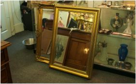 Two Modern Gilt Hall Mirrors, both with bevelled glass.