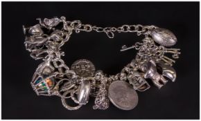 Silver Charm Bracelet Loaded With 19 Charms