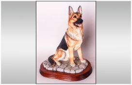 Large Border Fine Arts Figure 'German Shepherd', showing the seated dog looking alert; 11.25