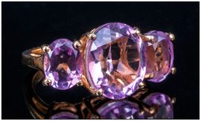 Kunzite Pink Quartz Three Stone Ring, the oval cut centre stone being 5cts, with a further oval