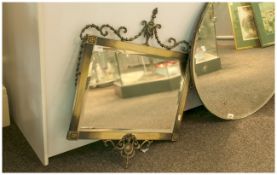 Metal Framed Mirror, bevelled glass 23 by 27 inches.
