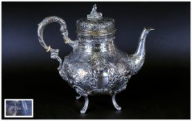 German Late 19th Century Very Ornate Embossed Silver Teapot, with Raised Bird and Floral Decoration.