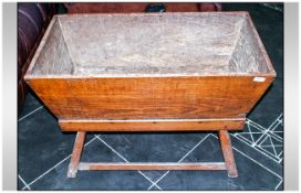 A French Elm Dough Trough, on square tapering leg stand with cross stretchers. Late 19thC. 35 by