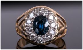 18ct Gold Set Diamond & Sapphire Cluster Ring The Central Sapphire Surrounded by 12 Diamonds of good