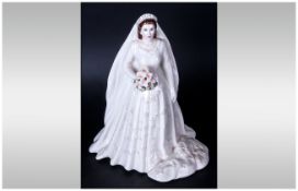 Royal Worcester Figure 'HM Queen Elizabeth ll', dressed as a bride; produced for her Diamond Wedding