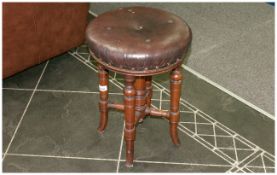 Late Victorian Walnut Piano Stool on Turned Legs and Stretchers, Round Leatherette Seat.