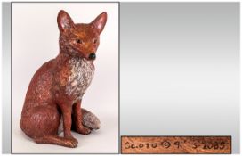 A Life size and Realistic Hand Painted Fox Figure, In a Sitting Position. Height 19 Inches.