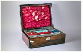 Rosewood Ladies Sewing Box with a fitted interior. Mother of Pearl roundell to the top.