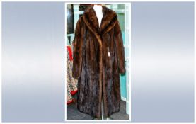 Ladies Full Length Dark Brown Mink Coat. Fully lined. Cape Sleeves, Hook & Loop Fastening. Label