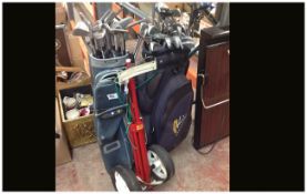 Golf Clubs, bags and trolley.