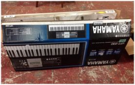 Yamaha Keyboard and Stand.