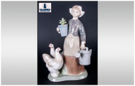 Lladro Figure Girl With Chickens & Watering Can, 9.5'' in height.