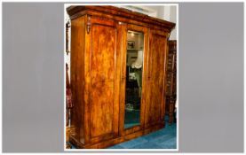 Large Victorian Walnut Triple Wardrobe with two side cupboards & a central mirrored door cupboard.