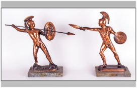 Pair of Spelter Coppered Figures of Gladiators on marble bases. 13 inches high.