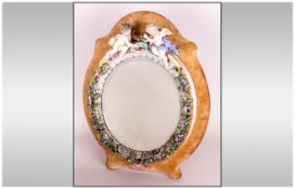 Meissen / Dresden 19th Century Porcelain Table Mirror with Applied Flowers and Cherubs Decoration.