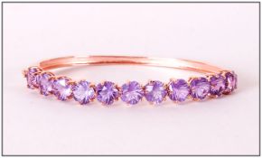 Flower Cut Rose de France Amethyst Bangle, eleven Rose de France amethysts, totalling 15cts, in an