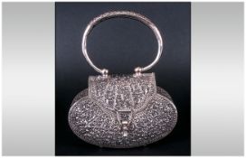 A Very Fine 19th Century Silver Handbag with impressive pierced & openwork decoration. Marked