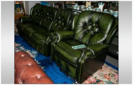 Two Piece Green Leather Suite Comprising three seater sofa 69'' in width, 36'' in height, 34'' in