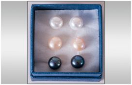 Three Pairs of Fresh Water Pearl Stud Earrings, button pearls of approximately 10mm diameter with