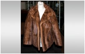 Ladies Light Brown Mink Jacket, Fully lined, collar with revers. Label reads 'Harry Barnado,