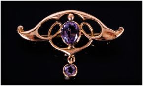 Victorian - Art Nouveau 9ct Gold and Amethyst Set Pendant / Brooch. Marked 9ct.