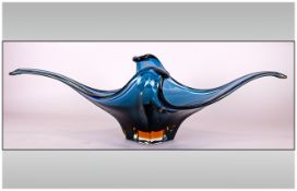Murano Glass Table Centre Piece, 56 cm wide. Blue coloured on an amber clear encased base.