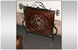Copper Embossed Firescreen with iron frame & attachments. In the art nouveau style. Embossed rose