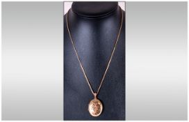 Ladies 9ct Gold Oval Hinged Locket, Suspended on a 9ct Gold Chain. Fully Hallmarked. Excellent