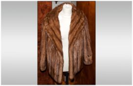 Ladies Light Brown Mink Jacket, Fully lined. Collar with revers, slit pockets & cuff sleeves.