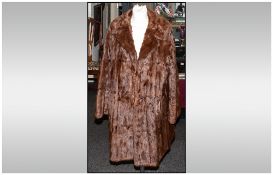 Ladies Three Quarter Length Squirrel Coat, fully lined, slit pocket. Collar with revers. Hook & Loop