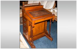 Edwardian Davenport Mahogany Desk with a lift up top. Fitted writing compartment and bank of 4