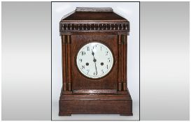 German / Austrian 19th Century Oak Cased Mantel Clock with Eight Day Striking and Chiming Movement