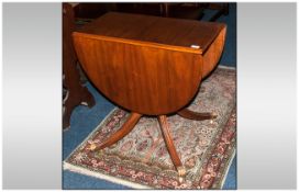 Reproduction Mahogany Regency Style Table with Drop Down, Demi Lune Shaped Leaves. Supported on a